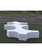 Panchina monoblocco in graniglia di marmo di particolare forma, senza schienale - totalmente levigata - cm 180x230x45h