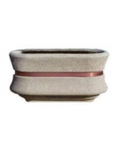 Fioriera in cemento calcestruzzo ovale colore Grigio pietra - con fascia color rame - cm 100x60x65h - conforme ai CAM