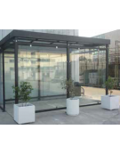 Pensilina smoking in acciaio, pareti in vetro, e tetto in lamiera grecata o policarbonato. Chiusa su 3 lati - cm 400x300x280h